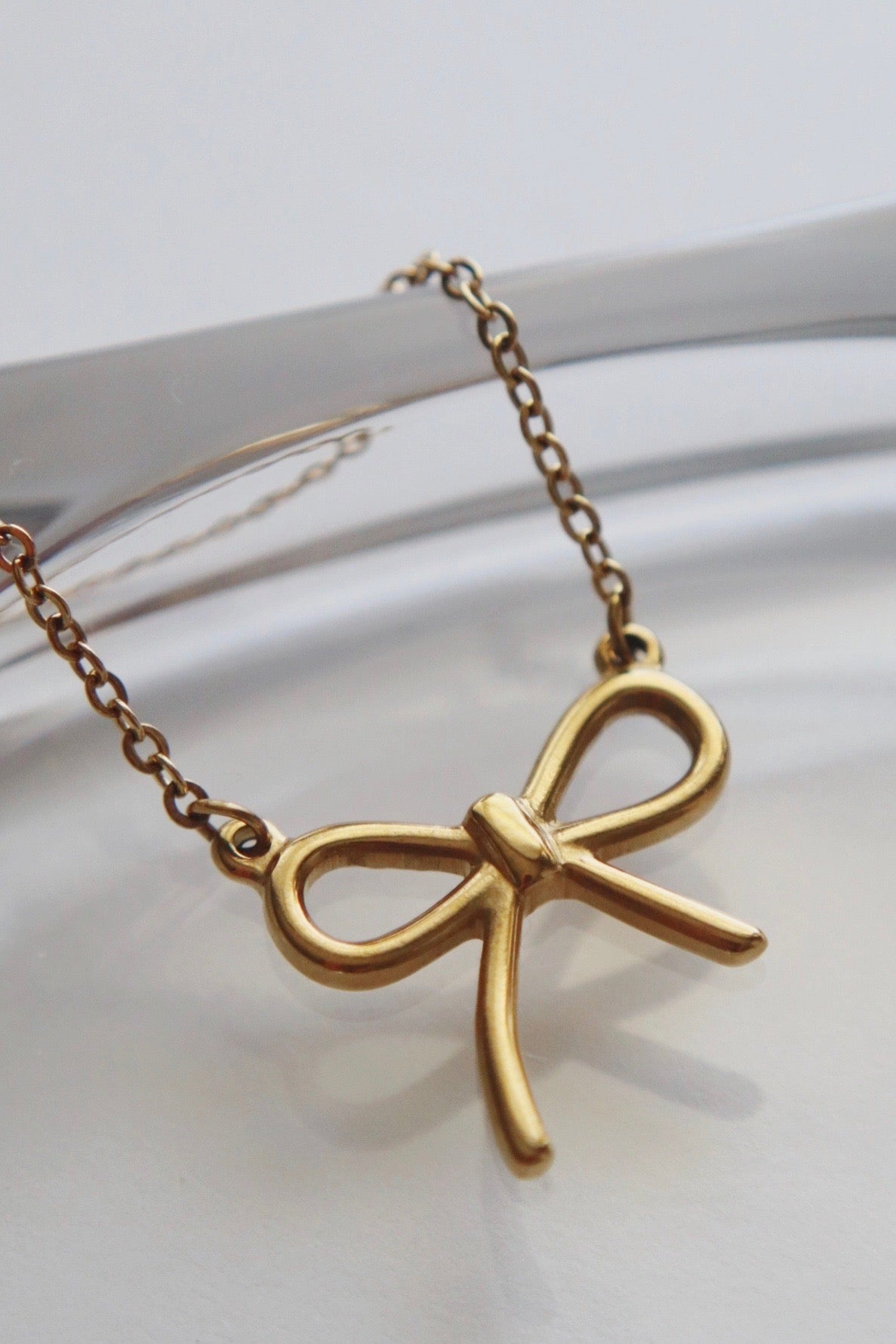 JESSA JEWELRY - BOW NECKLACE